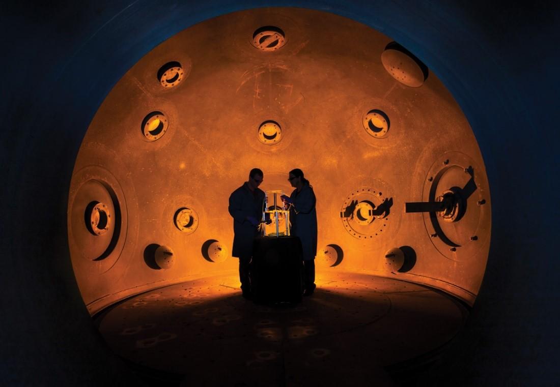 LLNL researchers prepare an experiment in a spherical chamber at the High Explosives Applications Facility (HEAF)