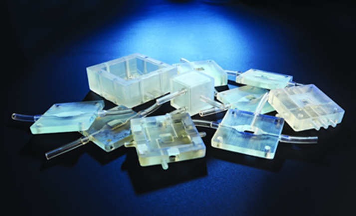 additively manufactured components for ammonia reactors that deliver nitrogen directly to the anode