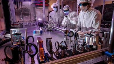From left: Drew Willard, Brendan Reagan and Issa Tamer work on the Big Aperture Thulium (BAT) laser system. (Photo: Jason Laurea/LLNL)