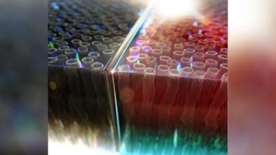 LLNL researchers have developed “smart” windows with vertically aligned carbon nanotubes that can modulate the transmission of near-infrared light, potentially cutting costs and energy usage in modern infrastructure. (Image: Jeremy Gardner/LLNL)
