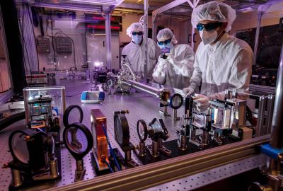 From left: Drew Willard, Brendan Reagan and Issa Tamer work on the Big Aperture Thulium (BAT) laser system. (Photo: Jason Laurea/LLNL)