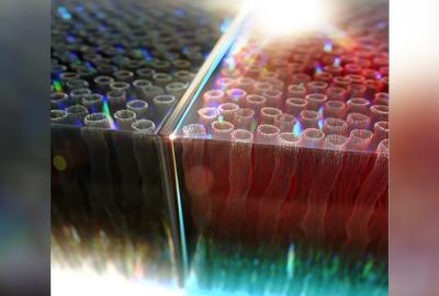 LLNL researchers have developed “smart” windows with vertically aligned carbon nanotubes that can modulate the transmission of near-infrared light, potentially cutting costs and energy usage in modern infrastructure. (Image: Jeremy Gardner/LLNL)