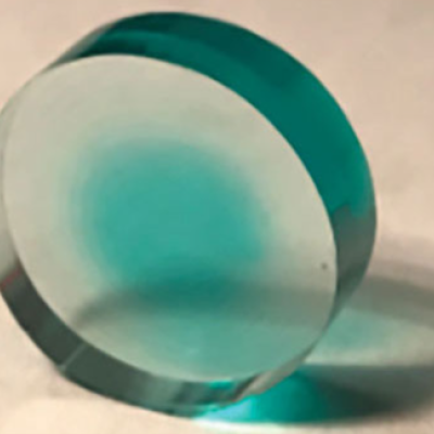 Thin disc of a transparent ceramic